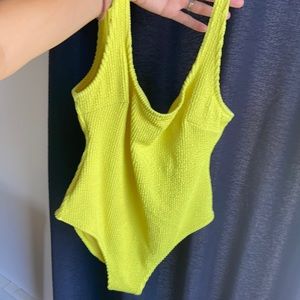 H&M stretchy high cut bathing suit. XXS, has great stretch so can fit a S.